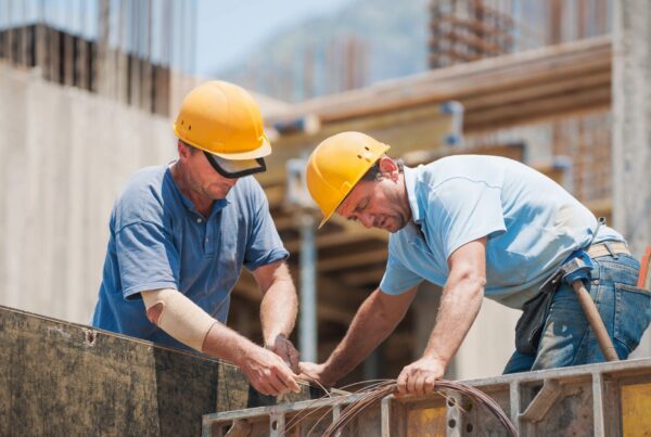 Contractor managing multiple crews with financial systems including job costing payroll and cash flow tracking